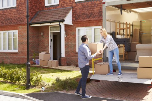 Movers loading furniture for a home removal in Seven Kings
