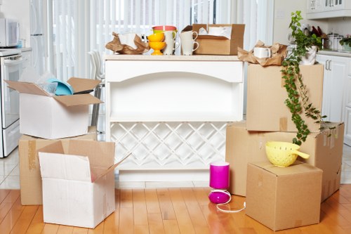 Local movers loading furniture in Seven Kings